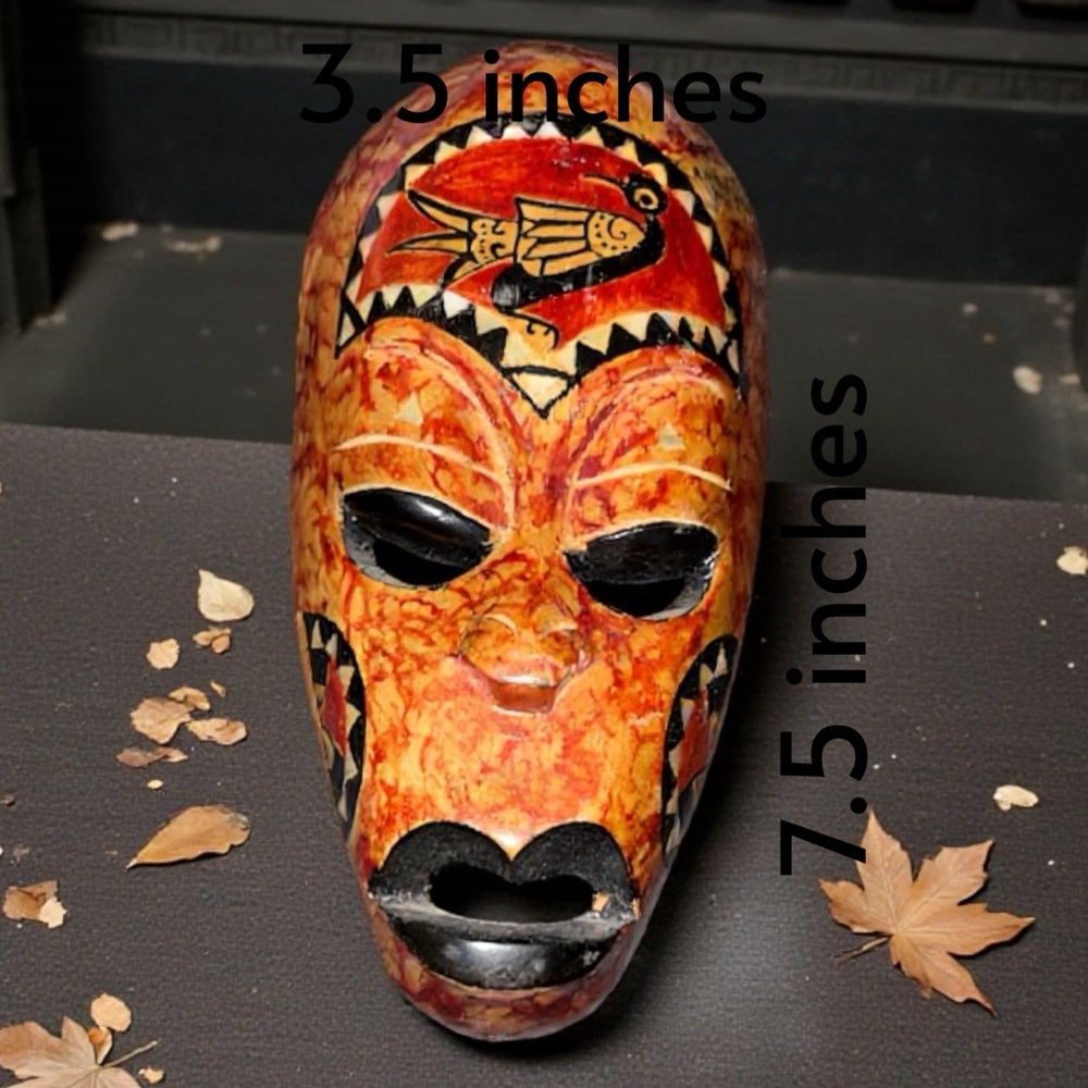 Handcrafted Tribal Mask with Intricate Patterns
